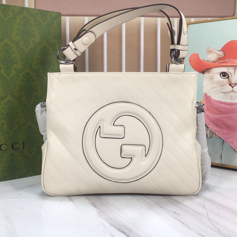 G*u*i shopping bags